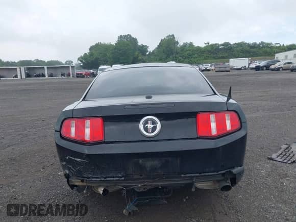 2012 Ford Mustang Premium with VIN 1ZVBP8AM7C5261635, listed as a IAAI auction lot 42981208 with 123,330 mi miles and . Bid and sale history available at DreamBid. Image 16.