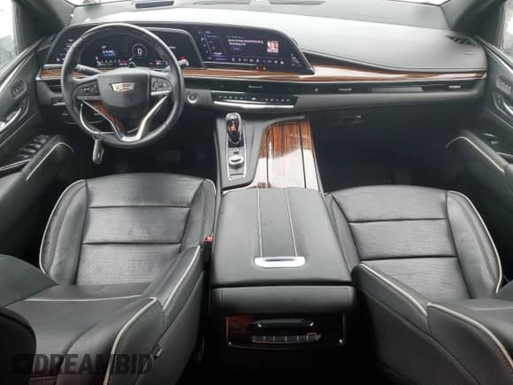2022 Cadillac Escalade Premium Luxury с VIN 1GYS4BKL3NR164999, выставлен на аукционе Copart как лот 58035295 с пробегом 42 871 миль миль и Списание • Salvage title. История ставок и продаж доступна на DreamBid. Изображение 8.