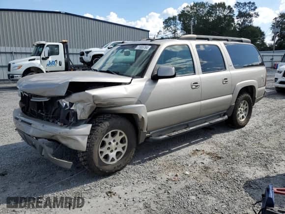 2005 Chevrolet Suburban LS z VIN 3GNFK16Z85G223199, wystawiony jako Copart lot #71655784 z przebiegiem Nie podano mil oraz Szkoda całkowita • Salvage title. Historia ofert i sprzedaży dostępna na DreamBid. Obrazek 1.