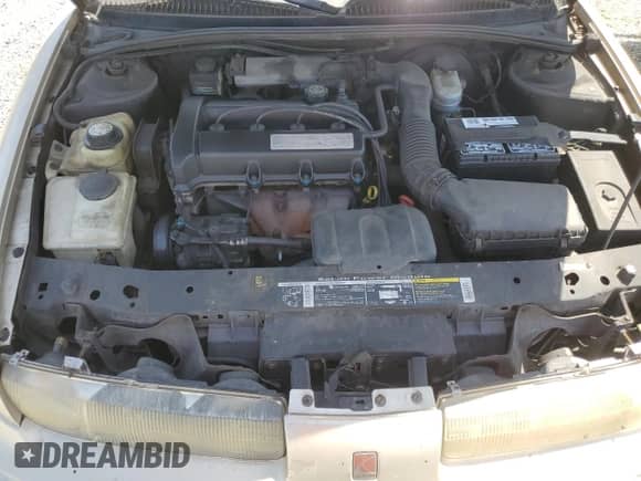 1998 Saturn SL z VIN 1G8ZK5272WZ276073, wystawiony jako Copart lot #69880235 z przebiegiem 147 663 mil mil oraz Szkoda całkowita • Salvage title. Historia ofert i sprzedaży dostępna na DreamBid. Obrazek 11.