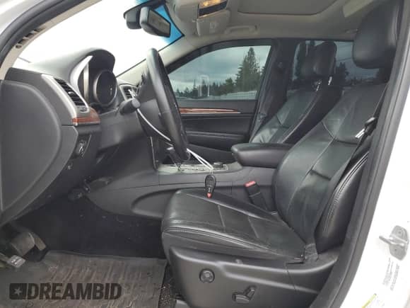 2013 Jeep Grand Cherokee Limited с VIN 1C4RJFBT2DC600277, выставлен на аукционе Copart как лот 80575905 с пробегом 123 885 миль миль и Списание • Salvage title. История ставок и продаж доступна на DreamBid. Изображение 7.