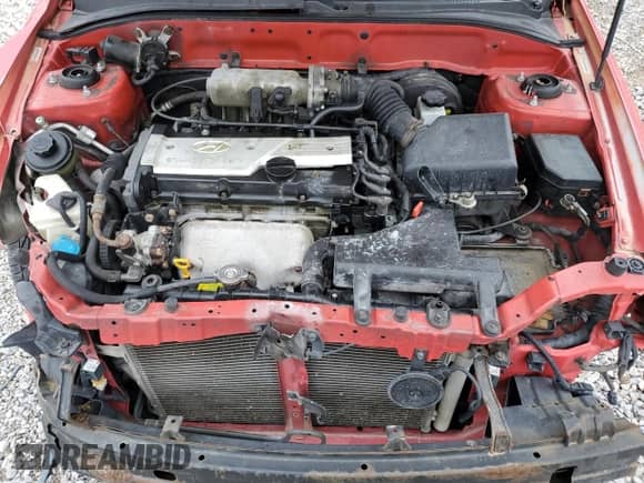 2005 Hyundai Accent GLS с VIN KMHCG35C35U341305, выставлен на аукционе Copart как лот 49783435 с пробегом 183 722 миль миль и Списание • Salvage title. История ставок и продаж доступна на DreamBid. Изображение 12.