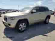 2012 Jeep Grand Cherokee Laredo z VIN 1C4RJEAG9CC177114, wystawiony jako Copart lot #70713065 z przebiegiem 105 759 mil mil oraz Czysty tytuł • Clean title. Historia ofert i sprzedaży dostępna na DreamBid. Obrazek 1.