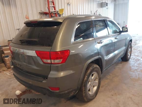 2012 Jeep Grand Cherokee Laredo с VIN 1C4RJFAG3CC214762, выставлен на аукционе IAAI как лот 43153932 с пробегом 257 360 миль миль и . История ставок и продаж доступна на DreamBid. Изображение 4.
