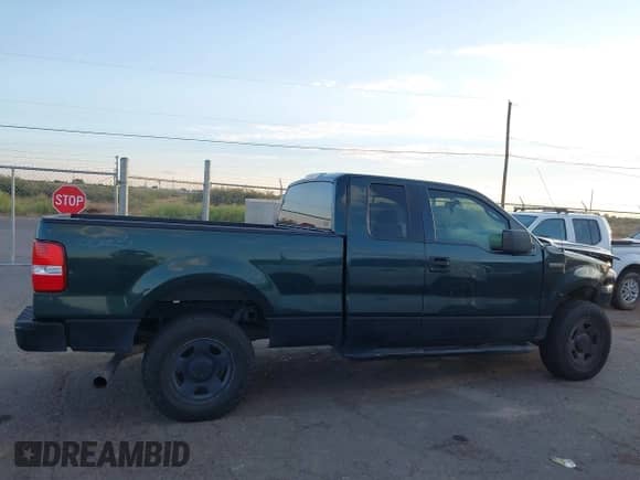 2005 Ford F-150 XLT z VIN 1FTPX14535FB19221, wystawiony jako IAAI lot #43425793 z przebiegiem 140 414 mil mil oraz . Historia ofert i sprzedaży dostępna na DreamBid. Obrazek 13.