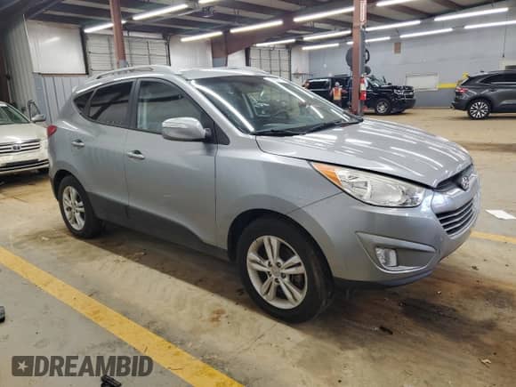 2013 Hyundai Tucson Limited z VIN KM8JU3AC7DU572809, wystawiony jako Copart lot #90926015 z przebiegiem 178 571 mil mil oraz Czysty tytuł • Clean title. Historia ofert i sprzedaży dostępna na DreamBid. Obrazek 4.