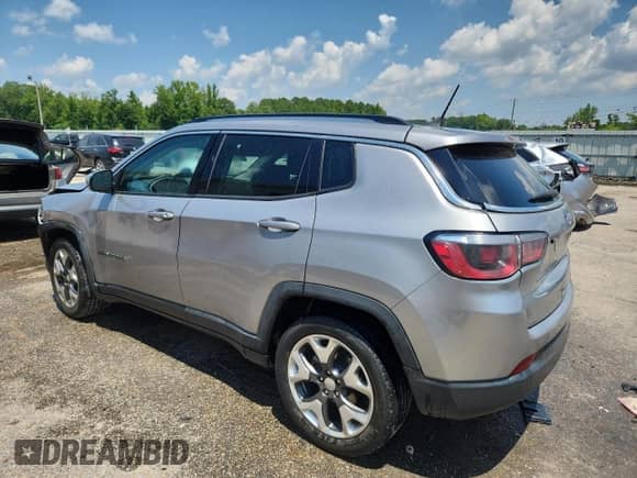 2020 Jeep Compass Limited with VIN 3C4NJCCB2LT187511, listed as a Copart auction lot 63769235 with 100,436 mi miles and Salvage title. Bid and sale history available at DreamBid. Image 2.
