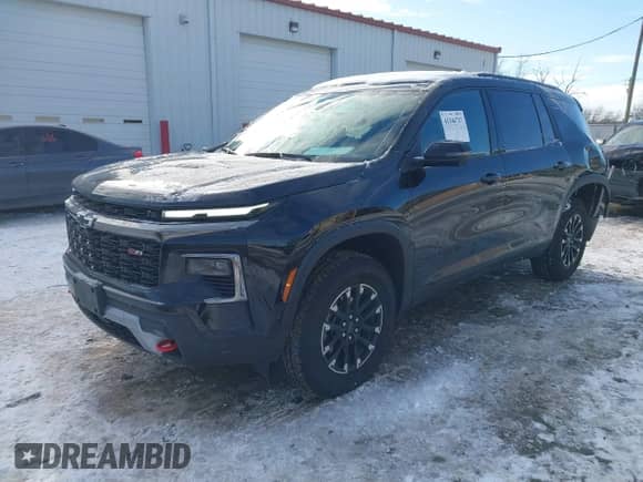 2024 Chevrolet Traverse AWD Z71 z VIN 1GNEVJKS0RJ155142, wystawiony jako IAAI lot #41346737 z przebiegiem 15 669 mil mil oraz . Historia ofert i sprzedaży dostępna na DreamBid. Obrazek 2.