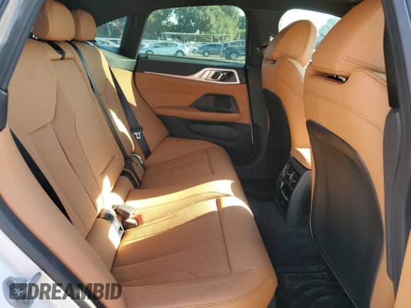 2025 BMW i4 eDrive40 z VIN WBY23HD00SFU99390, wystawiony jako Copart lot #80297005 z przebiegiem 3 402 mil mil oraz Szkoda całkowita • Salvage title. Historia ofert i sprzedaży dostępna na DreamBid. Obrazek 10.