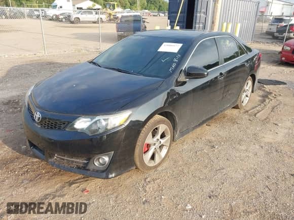 2014 Toyota Camry SE with VIN 4T1BF1FK1EU820993, listed as a IAAI auction lot 43000977 with 194,953 mi miles and . Bid and sale history available at DreamBid. Image 17.