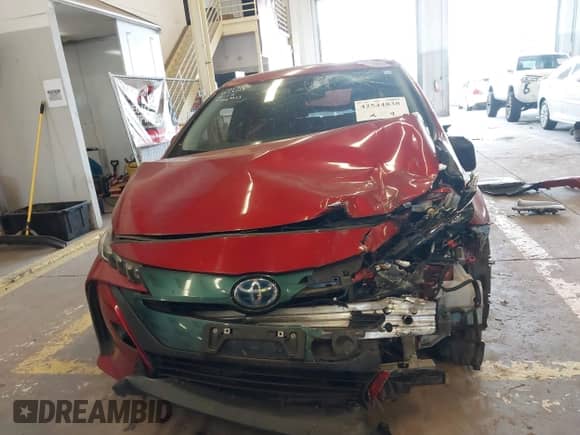 2018 Toyota Prius Plus z VIN JTDKARFP5J3077221, wystawiony jako IAAI lot #42544838 z przebiegiem 84 902 mil mil oraz . Historia ofert i sprzedaży dostępna na DreamBid. Obrazek 13.