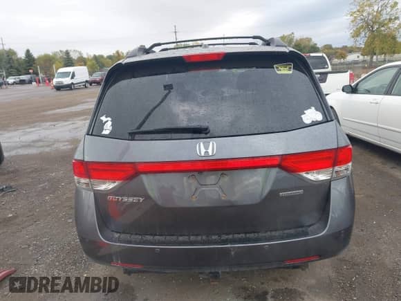 2016 Honda Odyssey Touring Elite z VIN 5FNRL5H92GB052661, wystawiony jako IAAI lot #43451962 z przebiegiem 145 569 mil mil oraz . Historia ofert i sprzedaży dostępna na DreamBid. Obrazek 16.