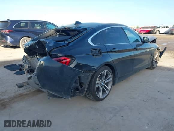 2018 BMW 4 Series 430i with VIN WBA4J1C55JBG76042, listed as a IAAI auction lot 42860141 with 96,052 mi miles and . Bid and sale history available at DreamBid. Image 4.