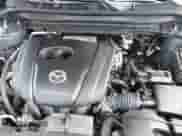 2022 Mazda CX-5 S Carbon Edition z VIN JM3KFBCM7N0579780, wystawiony jako IAAI lot #41460860 z przebiegiem 43 479 mil mil oraz . Historia ofert i sprzedaży dostępna na DreamBid. Obrazek 10.