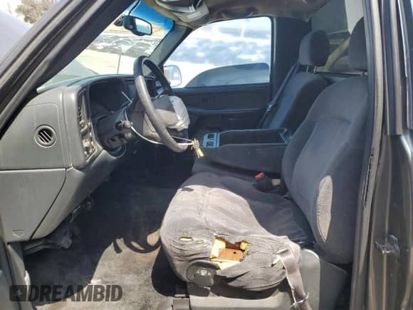 2002 Chevrolet Silverado 1500 LS with VIN 1GCEC14V82Z150008, listed as a Copart auction lot 58273165 with 357,104 mi miles and Salvage title. Bid and sale history available at DreamBid. Image 7.