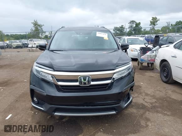 2021 Honda Pilot Elite z VIN 5FNYF6H00MB085972, wystawiony jako IAAI lot #43027676 z przebiegiem 48 133 mil mil oraz . Historia ofert i sprzedaży dostępna na DreamBid. Obrazek 12.