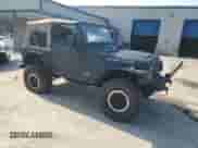 2003 Jeep Wrangler Rubicon с VIN 1J4FA69S23P310588, выставлен на аукционе Copart как лот 66919775 с пробегом 106 685 миль миль и Списание • Salvage title. История ставок и продаж доступна на DreamBid. Изображение 4.