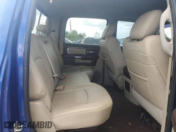 2014 Ram 1500 Laramie z VIN 1C6RR7VM0ES387931, wystawiony jako Copart lot #56866025 z przebiegiem 149 710 mil mil oraz Czysty tytuł • Clean title. Historia ofert i sprzedaży dostępna na DreamBid. Obrazek 10.