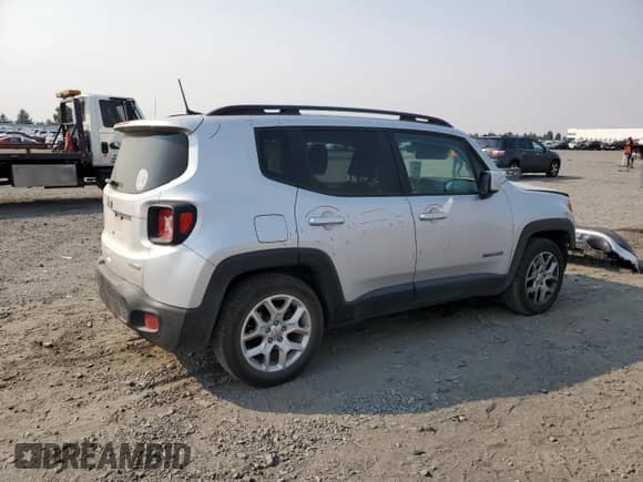 2018 Jeep Renegade Altitude with VIN ZACCJABB0JPH27164, listed as a Copart auction lot 71074155 with 87,098 mi miles and Salvage title. Bid and sale history available at DreamBid. Image 3.