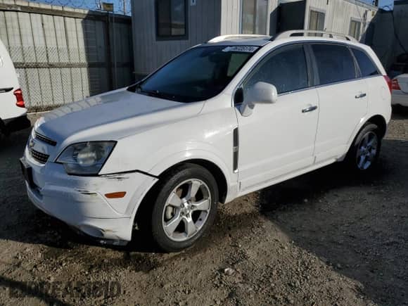 2014 Chevrolet Captiva Sport LT with VIN 3GNAL3EK5ES597340, listed as a Copart auction lot 76725174 with 105,797 mi miles and Clean title. Bid and sale history available at DreamBid. Image 1.