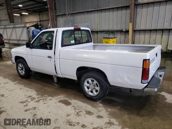 1997 Nissan Frontier XE with VIN 1N6SD11S7VC347105, listed as a Copart auction lot 85150705 with 255,765 mi miles and Salvage title. Bid and sale history available at DreamBid. Image 2.
