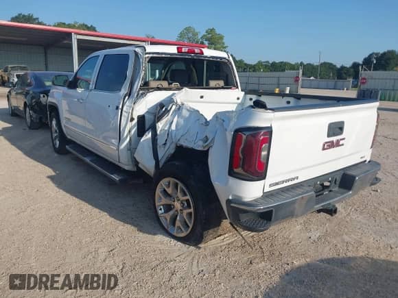 2018 GMC Sierra 1500 SLT z VIN 3GTP1NECXJG205818, wystawiony jako IAAI lot #42874974 z przebiegiem 144 799 mil mil oraz . Historia ofert i sprzedaży dostępna na DreamBid. Obrazek 3.