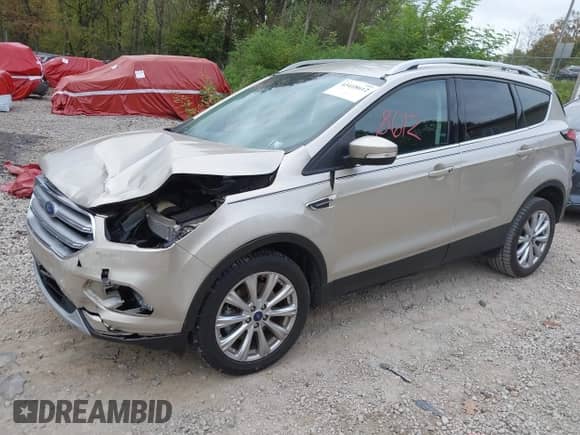 2017 Ford Escape Titanium with VIN 1FMCU9JD0HUC89677, listed as a IAAI auction lot 43418612 with 30,638 mi miles and . Bid and sale history available at DreamBid. Image 2.