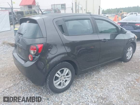 2013 Chevrolet Sonic LT with VIN 1G1JC6SB1D4209882, listed as a IAAI auction lot 43078938 with 139,018 mi miles and . Bid and sale history available at DreamBid. Image 4.