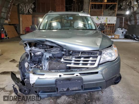 2011 Subaru Forester X with VIN JF2SHABC3BH776062, listed as a Copart auction lot 87313785 with 174,593 mi miles and Salvage title. Bid and sale history available at DreamBid. Image 5.