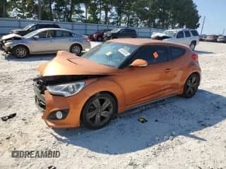 2014 Hyundai Veloster Turbo с VIN KMHTC6AE8EU200993, выставлен на аукционе Copart как лот 80393365 с пробегом 126 836 миль миль и Списание • Salvage title. История ставок и продаж доступна на DreamBid. Изображение 1.