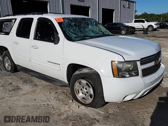 2013 Chevrolet Suburban LT с VIN 1GNSCJE05DR266380, выставлен на аукционе Copart как лот 63633955 с пробегом 209 338 миль миль и Списание • Salvage title. История ставок и продаж доступна на DreamBid. Изображение 14.