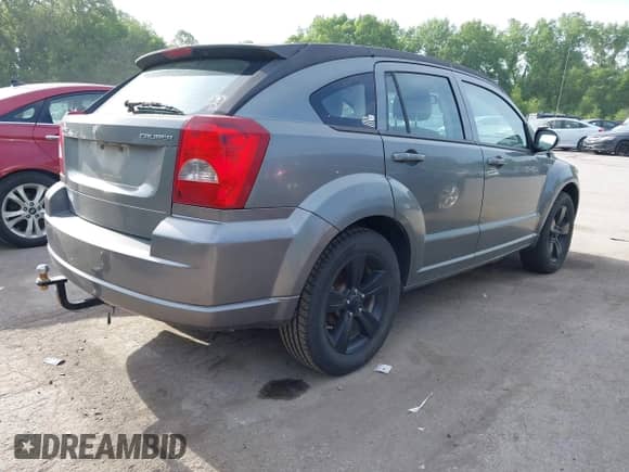 2011 Dodge Caliber Uptown with VIN 1B3CB9HB9BD254451, listed as a IAAI auction lot 42247772 with 188,757 mi miles and . Bid and sale history available at DreamBid. Image 4.