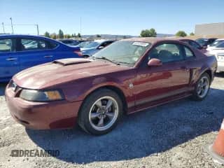 2004 Ford Mustang GT Deluxe с VIN 1FAFP42X64F121504, выставлен на аукционе Copart как лот 82528805 с пробегом 119 537 миль миль и Чистый • Clean title. История ставок и продаж доступна на DreamBid. Изображение 1.