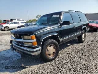 1996 Chevrolet Tahoe с VIN 1GNEK13R3TJ378433, выставлен на аукционе Copart как лот 69124565 с пробегом 331 337 миль миль и Списание • Salvage title. История ставок и продаж доступна на DreamBid. Изображение 1.