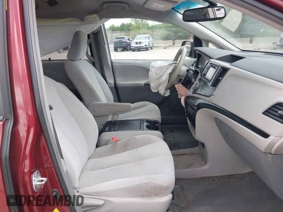 2014 Toyota Sienna LE AAS with VIN 5TDKK3DC7ES435563, listed as a IAAI auction lot 43014633 with 201,161 mi miles and . Bid and sale history available at DreamBid. Image 5.