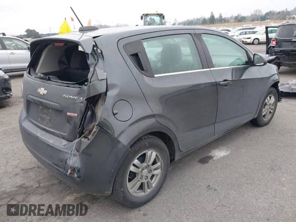 2016 Chevrolet Sonic LT with VIN 1G1JC6SB6G4145245, listed as a IAAI auction lot 41353744 with 103,371 mi miles and . Bid and sale history available at DreamBid. Image 4.