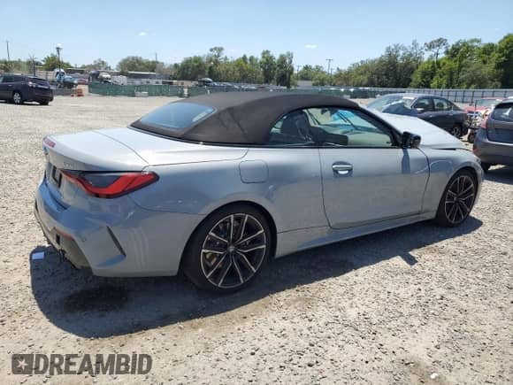 2022 BMW 4 Series 430i xDrive with VIN WBA43AT07NCJ20732, listed as a Copart auction lot 55248585 with 9,040 mi miles and Salvage title. Bid and sale history available at DreamBid. Image 3.