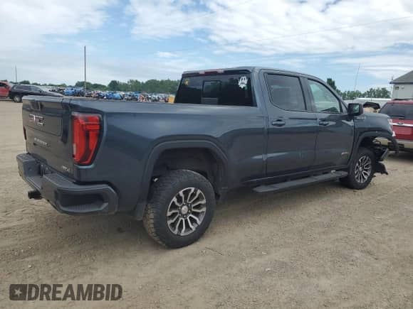 2019 GMC Sierra 1500 AT4 with VIN 1GTP9EED6KZ365682, listed as a Copart auction lot 61931675 with 107,144 mi miles and Salvage title. Bid and sale history available at DreamBid. Image 3.