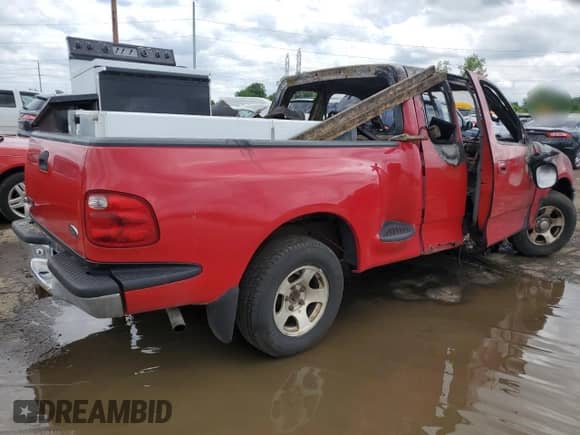 2000 Ford F-150 XL z VIN 2FTRX07L6YCA33124, wystawiony jako Copart lot #58989405 z przebiegiem Nie podano mil oraz Szkoda całkowita • Salvage title. Historia ofert i sprzedaży dostępna na DreamBid. Obrazek 3.