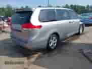 2013 Toyota Sienna L with VIN 5TDZK3DC3DS348420, listed as a IAAI auction lot 42560718 with 221,621 mi miles and . Bid and sale history available at DreamBid. Image 4.