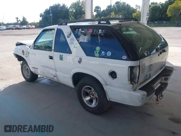 2003 Chevrolet Blazer Xtreme with VIN 1GNCS18X63K137572, listed as a IAAI auction lot 43511000 with 130,937 mi miles and . Bid and sale history available at DreamBid. Image 3.