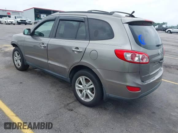 2012 Hyundai Santa Fe Limited с VIN 5XYZKDAG5CG095271, выставлен на аукционе IAAI как лот 42409813 с пробегом 154 757 миль миль и . История ставок и продаж доступна на DreamBid. Изображение 3.