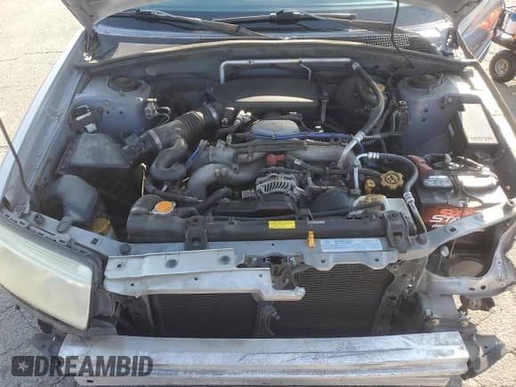 2006 Subaru Forester X with VIN JF1SG63696H757518, listed as a Copart auction lot 81303325 with 127,853 mi miles and Salvage title. Bid and sale history available at DreamBid. Image 11.