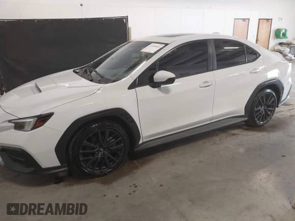 2023 Subaru WRX Premium с VIN JF1VBAF68P9823577, выставлен на аукционе IAAI как лот 42300844 с пробегом 13 055 миль миль и . История ставок и продаж доступна на DreamBid. Изображение 19.