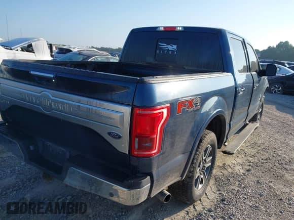 2015 Ford F-150 XLT with VIN 1FTEW1EG7FFB61354, listed as a IAAI auction lot 42822277 with 184,661 mi miles and . Bid and sale history available at DreamBid. Image 4.