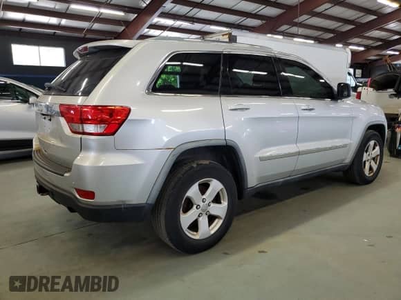 2012 Jeep Grand Cherokee Laredo z VIN 1C4RJFAG2CC166493, wystawiony jako Copart lot #70057955 z przebiegiem 168 606 mil mil oraz Czysty tytuł • Clean title. Historia ofert i sprzedaży dostępna na DreamBid. Obrazek 3.