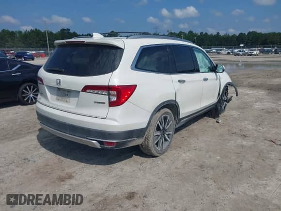 2019 Honda Pilot Touring 8-Passenger z VIN 5FNYF5H9XKB001842, wystawiony jako IAAI lot #43026784 z przebiegiem 114 674 mil mil oraz . Historia ofert i sprzedaży dostępna na DreamBid. Obrazek 4.