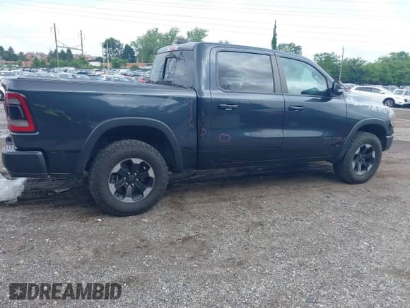 2019 Ram 1500 Rebel z VIN 1C6SRFLT1KN784936, wystawiony jako IAAI lot #42375986 z przebiegiem 78 539 mil mil oraz . Historia ofert i sprzedaży dostępna na DreamBid. Obrazek 4.