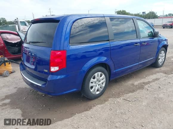 2019 Dodge Grand Caravan SE with VIN 2C4RDGBG7KR676386, listed as a IAAI auction lot 43284137 with 120,250 mi miles and . Bid and sale history available at DreamBid. Image 4.