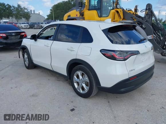2025 Honda HR-V LX with VIN 3CZRZ1H31SM726848, listed as a IAAI auction lot 42785818 with 7,039 mi miles and . Bid and sale history available at DreamBid. Image 3.